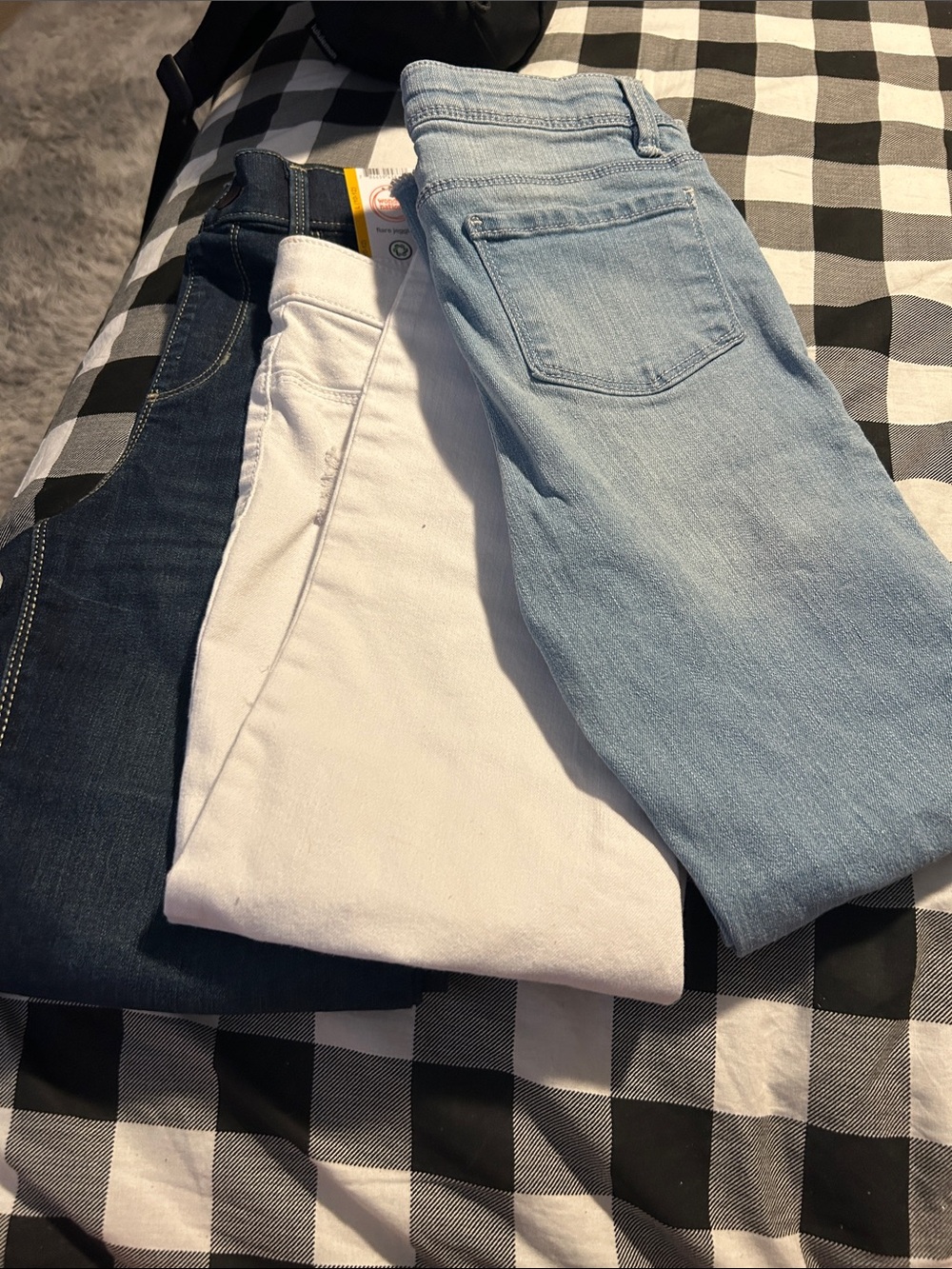 Three pairs of jeans size 10/12